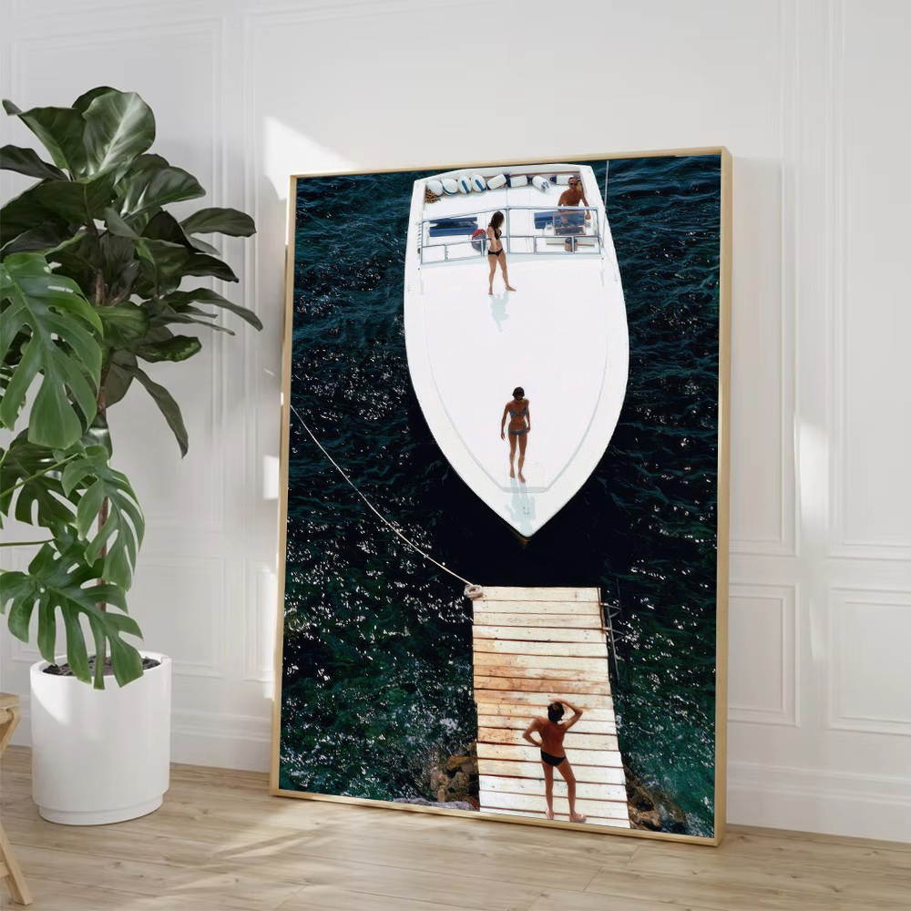 Slim Aarons Speedboat Landing  - Badminton Poster recensie en prijs